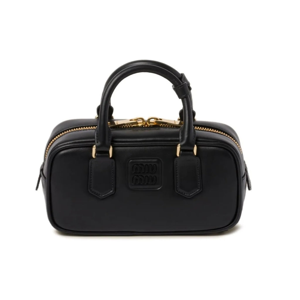 Miu Miu Small bag with brand logo brooch